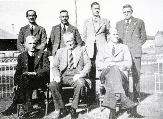 Leonora Road Board 1945. Back: DD McKinnon, H Devine, GEF Chomley, D Cuthbertson. Seated: R Brown, H Hadfield, W Cleland.