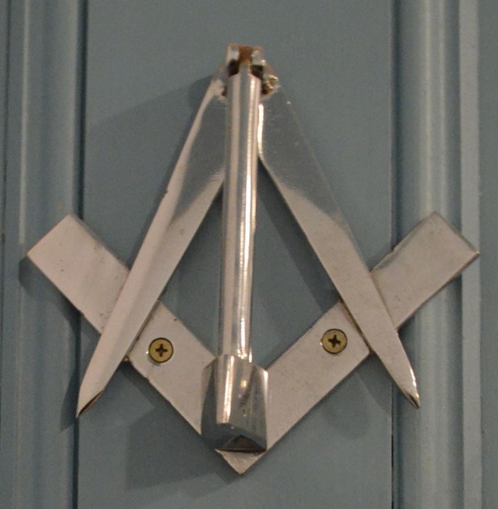 Image Gallery - The door knocker is in the form of the Masonic symbol.